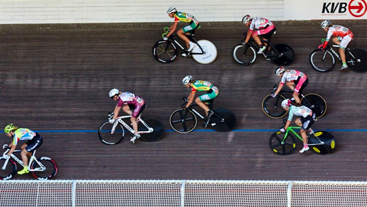 Cyclists racing indoors at RheinEnergieSTADION